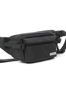 Minimalist black checkered chest bag with multiple zippers and adjustable buckle strap