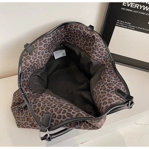 Top view showing the spacious interior and leopard print material of the tote bag