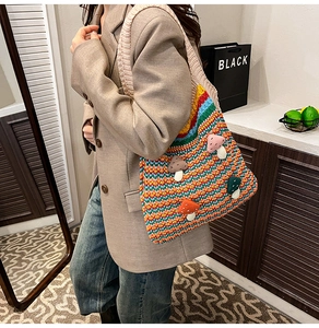 Rainbow striped crochet tote bag featuring 3D mushroom appliqués on a hand-knitted surface