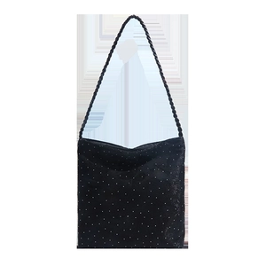 Minimalist black tote bag with white polka dots and woven rope shoulder straps