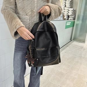 Sac à dos minimaliste en similicuir noir pour étudiants avec charm chien marron