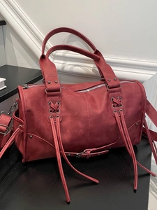 Deep red retro wasteland style oversized motorcycle tote bag with tassels and silver hardware