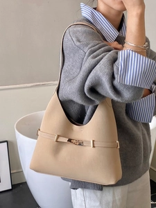 Large khaki tote bag in matte faux leather with a golden metal buckle for casual women style