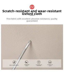 Detail shot of scratch-resistant oxford fabric showing water resistance and durability test