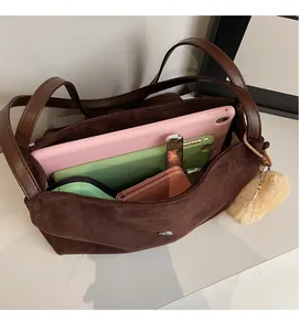 Deep brown suede tote bag interior view with large capacity and metal snap closure