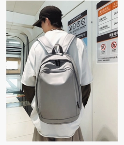 Soft leather backpack for men shown on back in metro station for lifestyle view