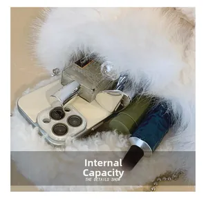 Detail showing the internal storage of the white plush basket bag with daily essentials