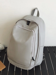 Minimalist grey waterproof backpack with large capacity and multi-zipper compartments