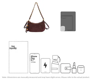 Détail de la capacité intérieure montrant l'espace pour téléphone en sac en daim