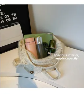 Spacious interior of beige knit tote bag showing large capacity for personal items