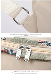 Detail of reinforced triangle stitching and silver butterfly zipper on cream nylon backpack