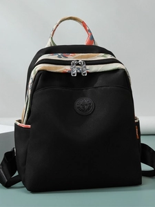 Fashionable black oxford backpack with ethnic floral straps and large capacity for travel