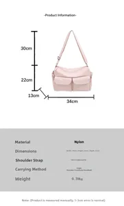 Size chart for pink nylon crossbody bag with dimensions 34x22x13cm and strap details