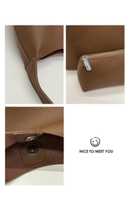 Close-up of litchi texture brown leather bucket bag with silver hardware and magnetic snap