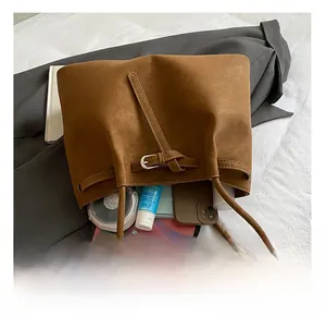 Internal view showing the large capacity of this brown tote bag for daily essentials