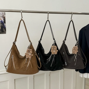 Harajuku style large capacity tote bag in brown and black leather with plush bear charm