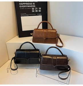Three retro small square crossbody bags in brown, black, and coffee faux leather finish