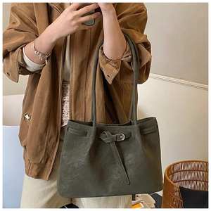 Olive green suede tote bag with decorative strap and silver buckle for daily shoulder wear
