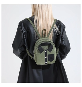 Detailed back view of a mini army green suede backpack featuring a shirt collar design
