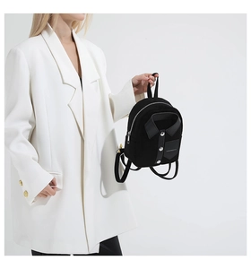 Detailed close-up of a creative shirt-style mini backpack with collar and button details
