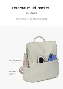 Detail view of woven texture beige backpack with functional side pockets and rabbit logo