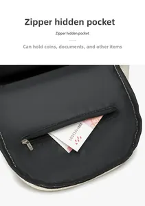 Close-up of internal zipper pocket in backpack with durable black lining and silver slider