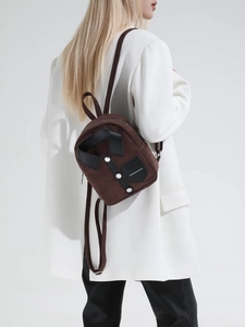 Minimalist dark brown suede mini backpack with stylish collar design and metal buttons