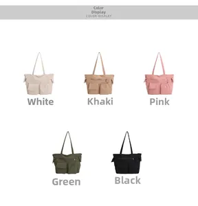 Detail view showing five colors of corduroy tote bags with multi-pocket design on front