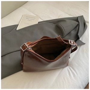 2025 Winter large brown oil-wax leather tote bag with spacious interior and silver buckle