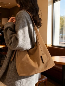 Retro camel suede hobo tote bag for women showing spacious interior and soft texture