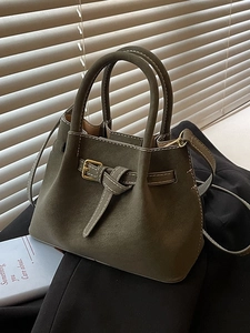 Deep olive green suede handbag with white contrast stitching and gold buckle detail