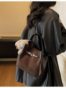 Borsa a secchiello vintage marrone scuro con trama scamosciata e chiusura metallica