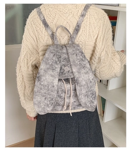 Detail of grey vintage tote bag with rabbit ear design and Hao Hello embroidery