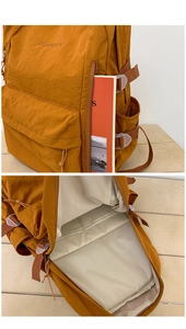 Details der karamellfarbenen Nylon-Rucksack-Außenseite und des geräumigen Innenlebens