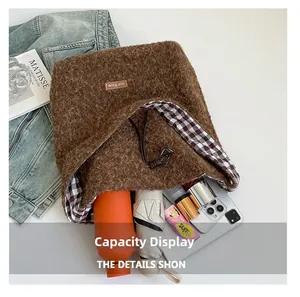 Large capacity display of the brown teddy fleece tote bag with internal checkered lining
