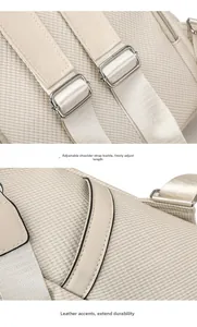 Detail of adjustable silver buckles and beige leather trim on stylish fabric backpack