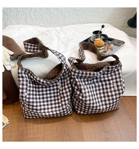 Detail of vintage brown plaid tote bag with soft plush lining and front pocket detail