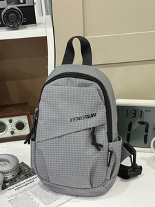 Retro grey plaid crossbody chest bag for women, large capacity shoulder bag shown with accessories