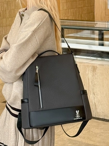 Fashionable dark gray high-capacity travel backpack with nylon texture and metal zipper