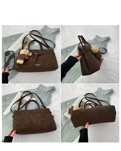 Brown faux suede handbag shown from front, side, and back angles with bear charm