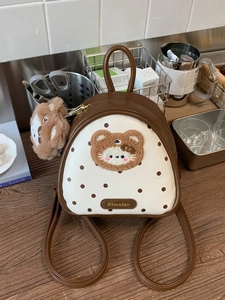 Polka dot mini backpack with 3D plush bear head and matching charm accessory