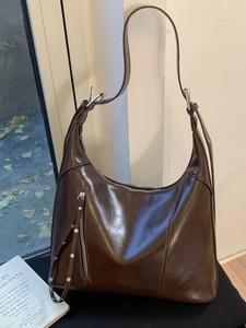 Retro dark brown hobo shoulder bag in shiny oil wax leather with vertical zipper