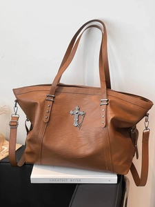 Vintage dark brown large tote bag with metallic cross pendant and star rivets