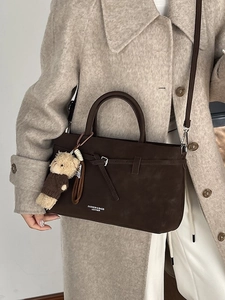 Minimalist brown suede leather handbag with cute bear charm and adjustable strap