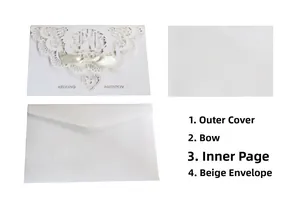 Wedding invitation set detail showing laser cut cover, ribbon, inner sheet, and envelope