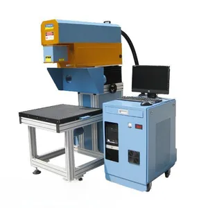 Industrial laser cutting machine with blue and yellow frame for intricate cardstock engraving