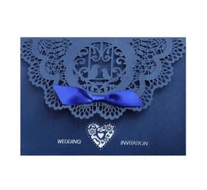 Elegant navy blue laser cut wedding invitation with lovebirds and satin bow