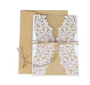 Laser cut butterfly wedding invitation with white paper sleeve and kraft envelope