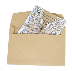 Elegant laser-cut butterfly invitation set with kraft envelope and rustic jute string