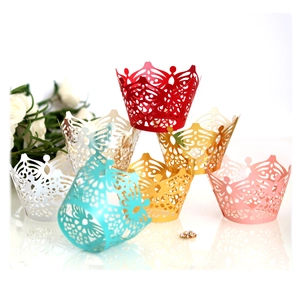 Laser cut crown cupcake wrappers in various colors with intricate hollow lace designs
